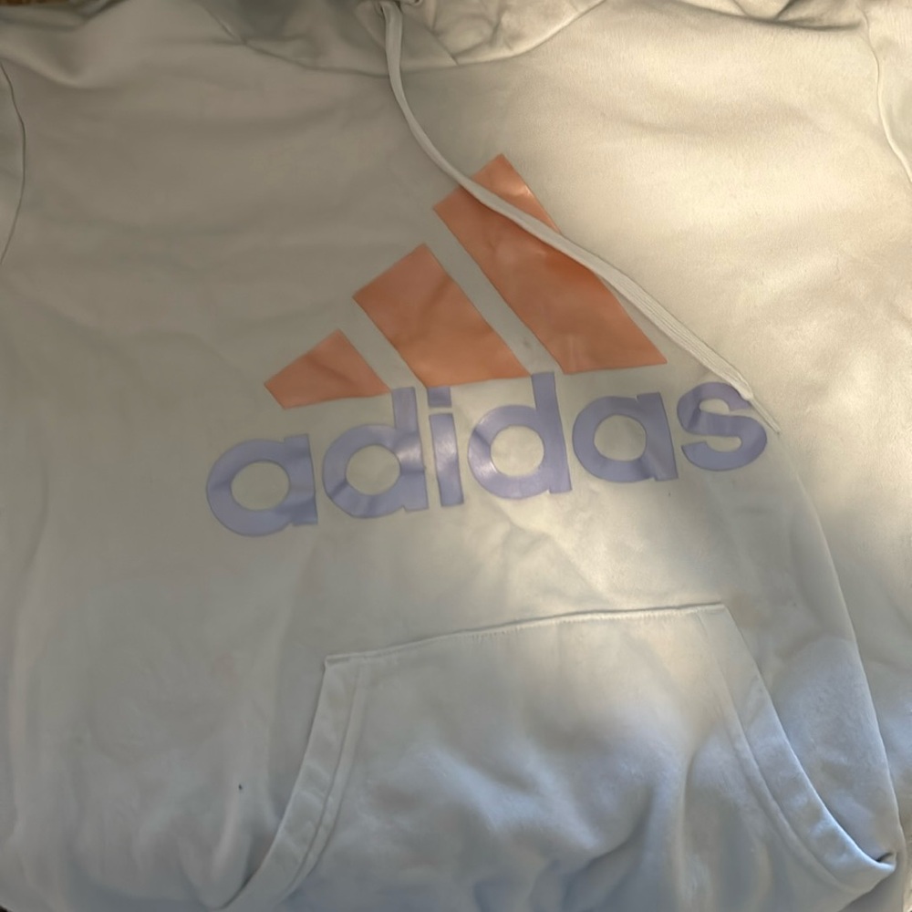 White Adidas hoodie with pastel purple and orange logo. Super cute!